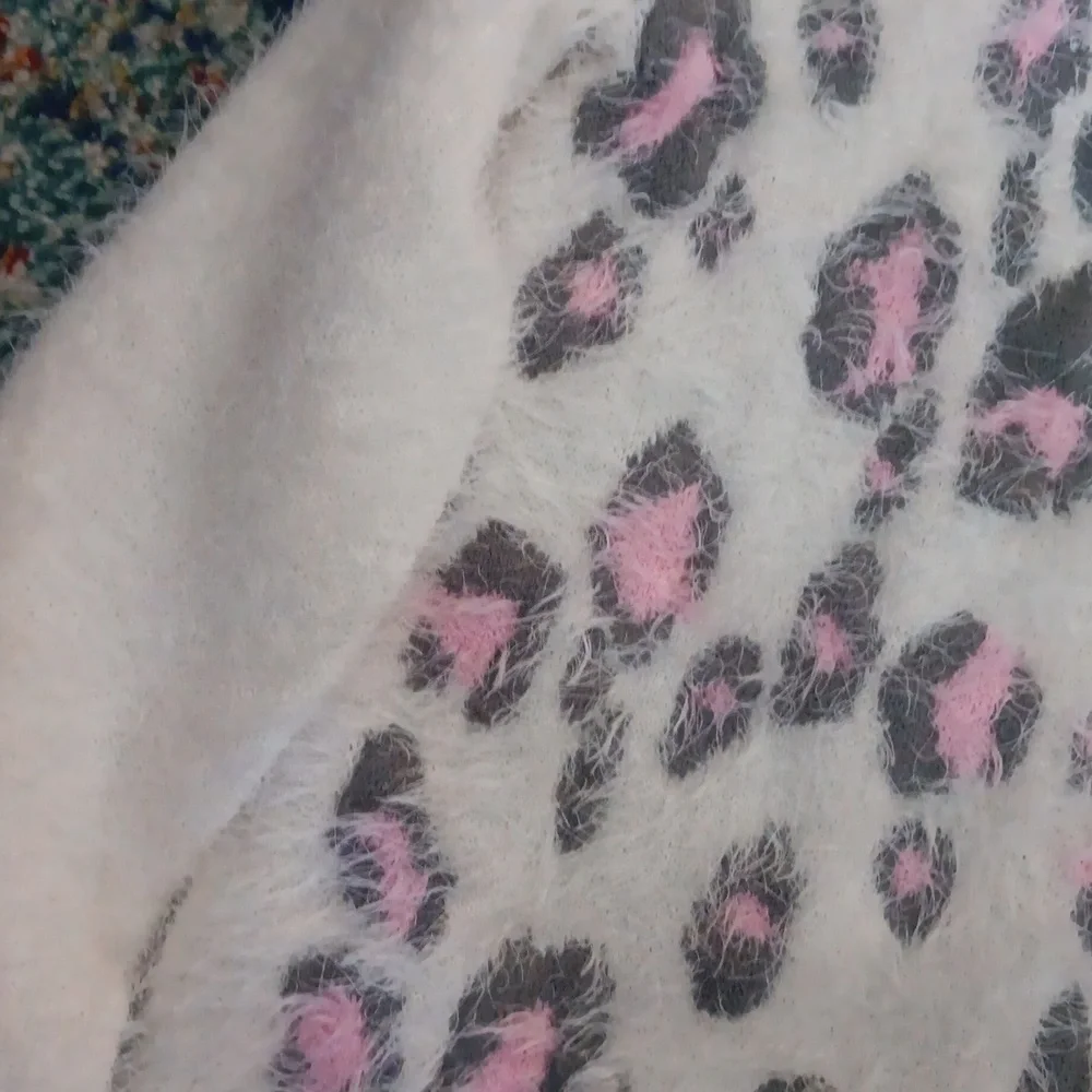 Super soft fuzzy cheetah print sweater